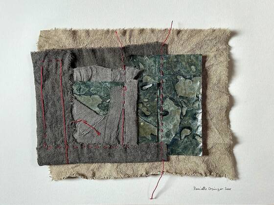 Textile collage of grey and natural-coloured fabric with blue-green marbled paper, crossed by red stitching.